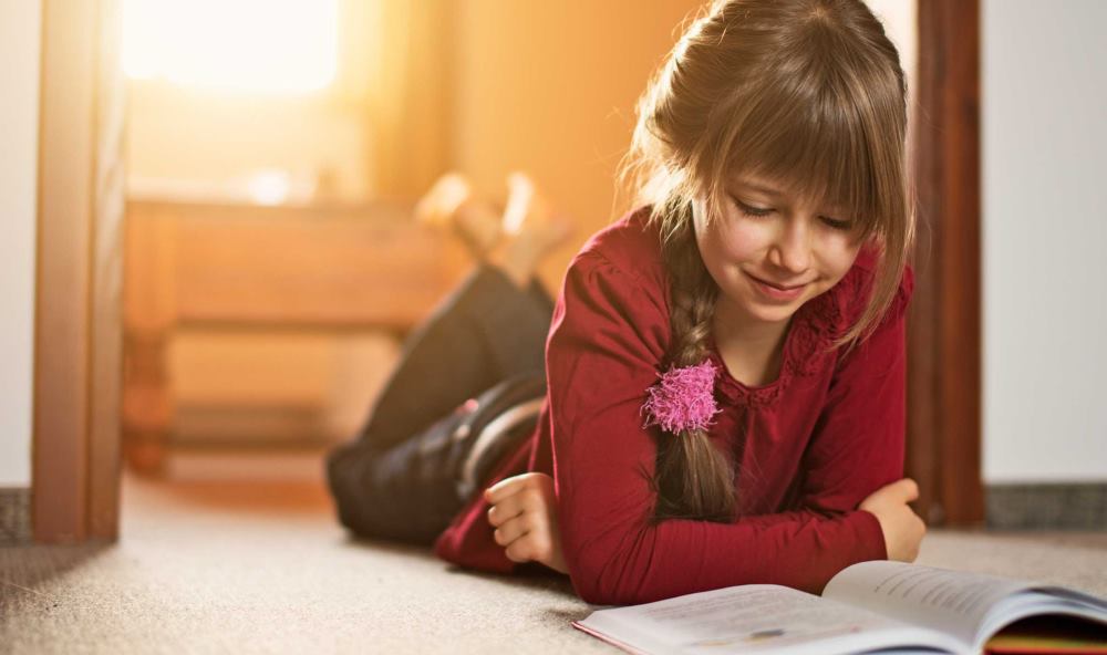 child reading book