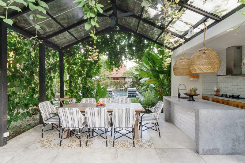 dining room table and chairs in open kitchen