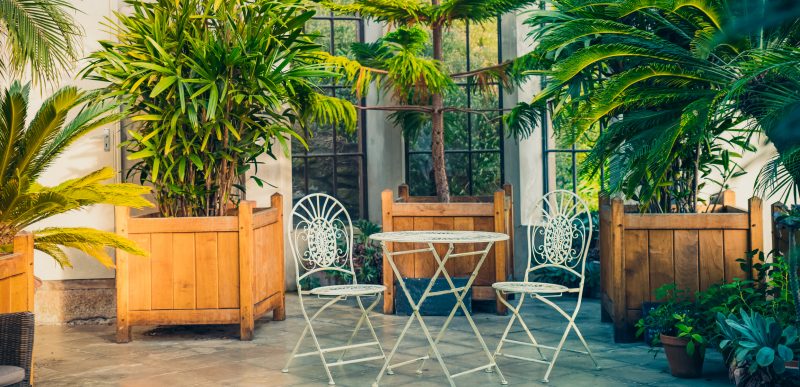 modern orangery with garden furniture